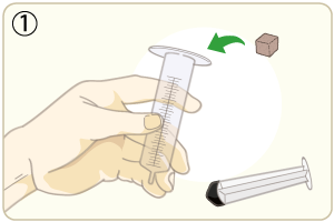 空の注射器に糸ミミズを入れます。